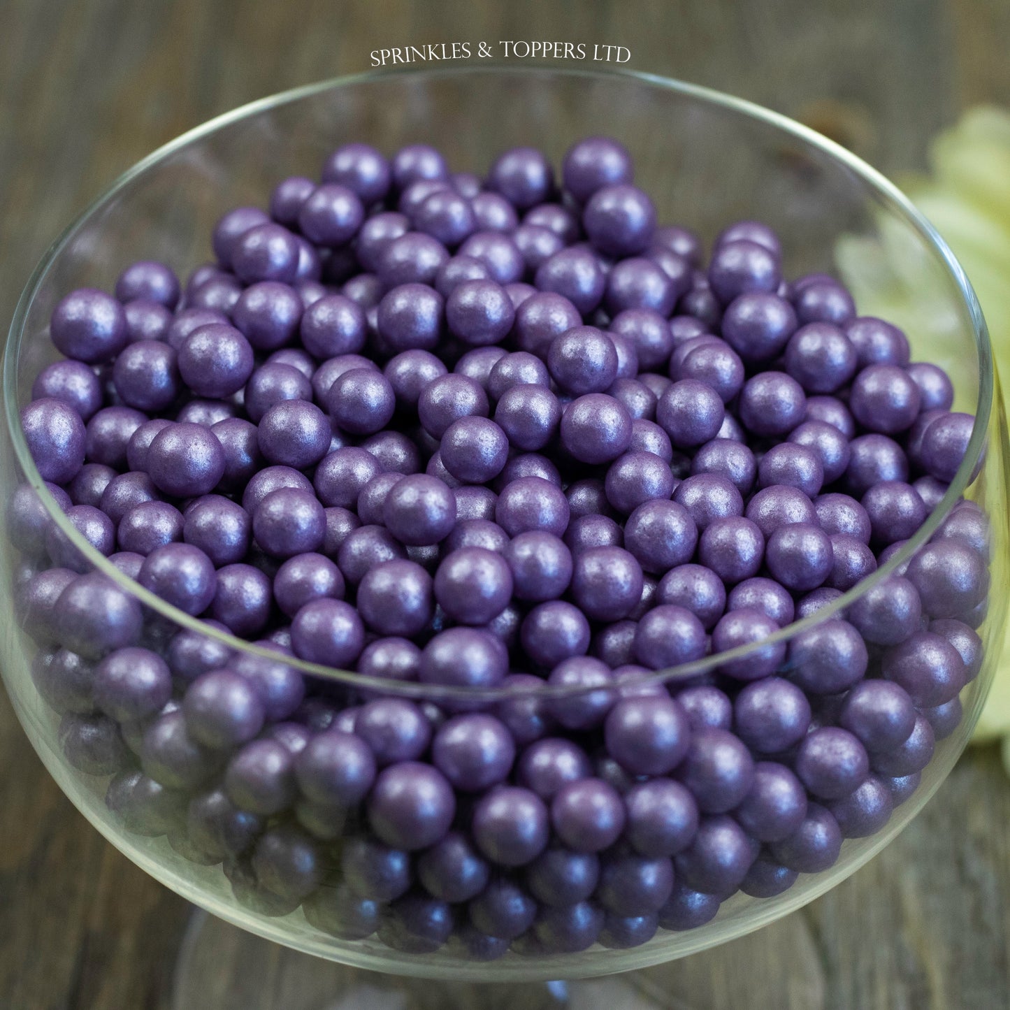 Lovely purple edible sugar pearls with shiny finish 7mm (approx) Perfect to decorate cupcakes, a large cake, ice creams, smoothies, cookies.....the list is endless