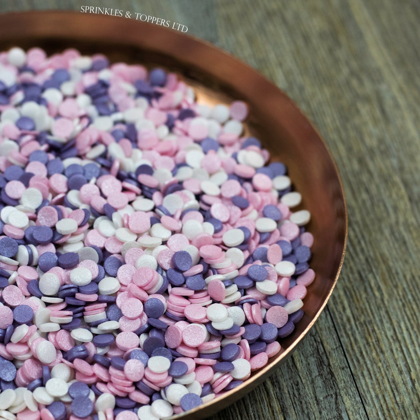 4mm Pink White & Purple Glimmer Confetti Edible confetti with a lovely shiny finish Perfect to top any cupcake, large cake, ice cream, cookies, shakes and more...