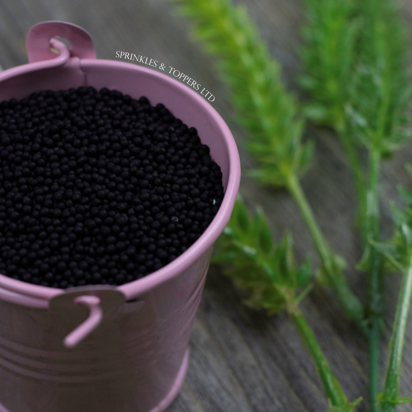 Black 100s & 1000s These ever popular small sugar balls are perfect to top any cupcake, large cake, ice cream, shake and more...