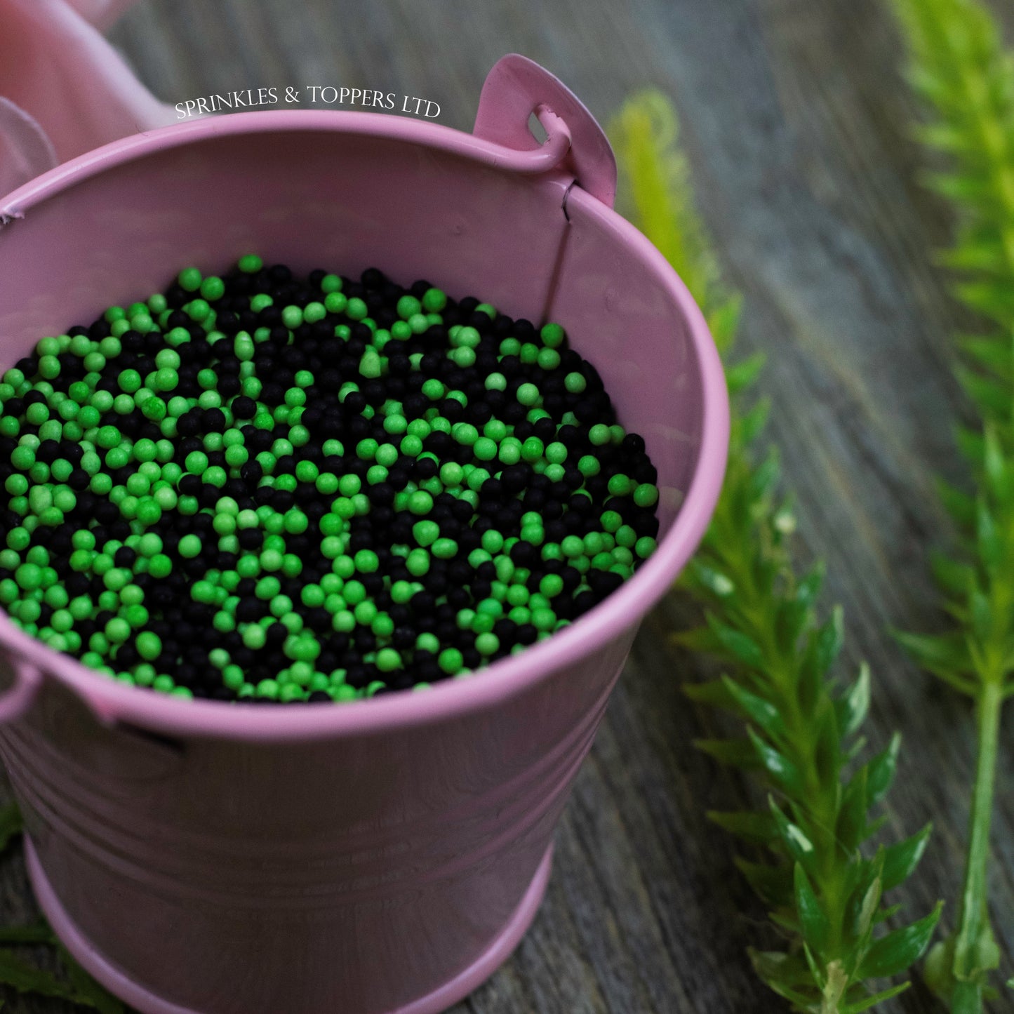 Black & Green 100s & 1000s These ever popular small sugar balls are perfect to top any cupcake, large cake, ice cream, shake and more...