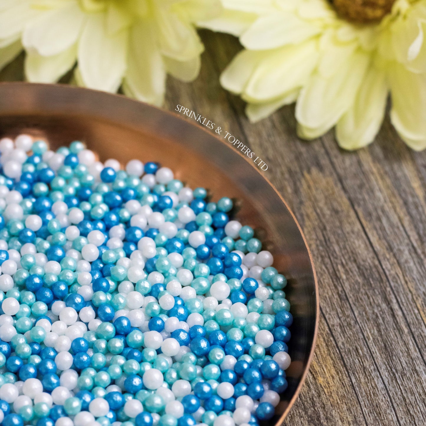 Blue, White & Turquoise Glimmer Pearls Sprinkles Mix Lovely edible sugar pearls with shiny finish 3-4mm (approx) Perfect to decorate cupcakes, a large cake, ice creams, smoothies, cookies.....the list is endless