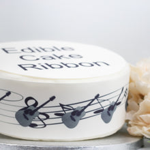 Load image into Gallery viewer, ACOUSTIC GUITAR &amp; MUSIC NOTES EDIBLE ICING CAKE RIBBON / SIDE STRIPS   Use instead of traditional ribbon to decorate the sides of your cakes  Edible fondant icing, perfect for that special occasion