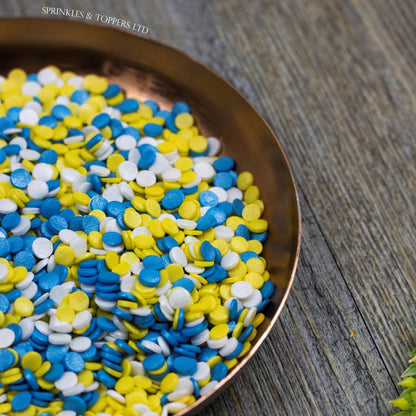4mm Blue White & Yellow Glimmer Confetti  Edible confetti with a lovely shiny finish  Perfect to top any cupcake, large cake, ice cream, cookies, shakes and more...