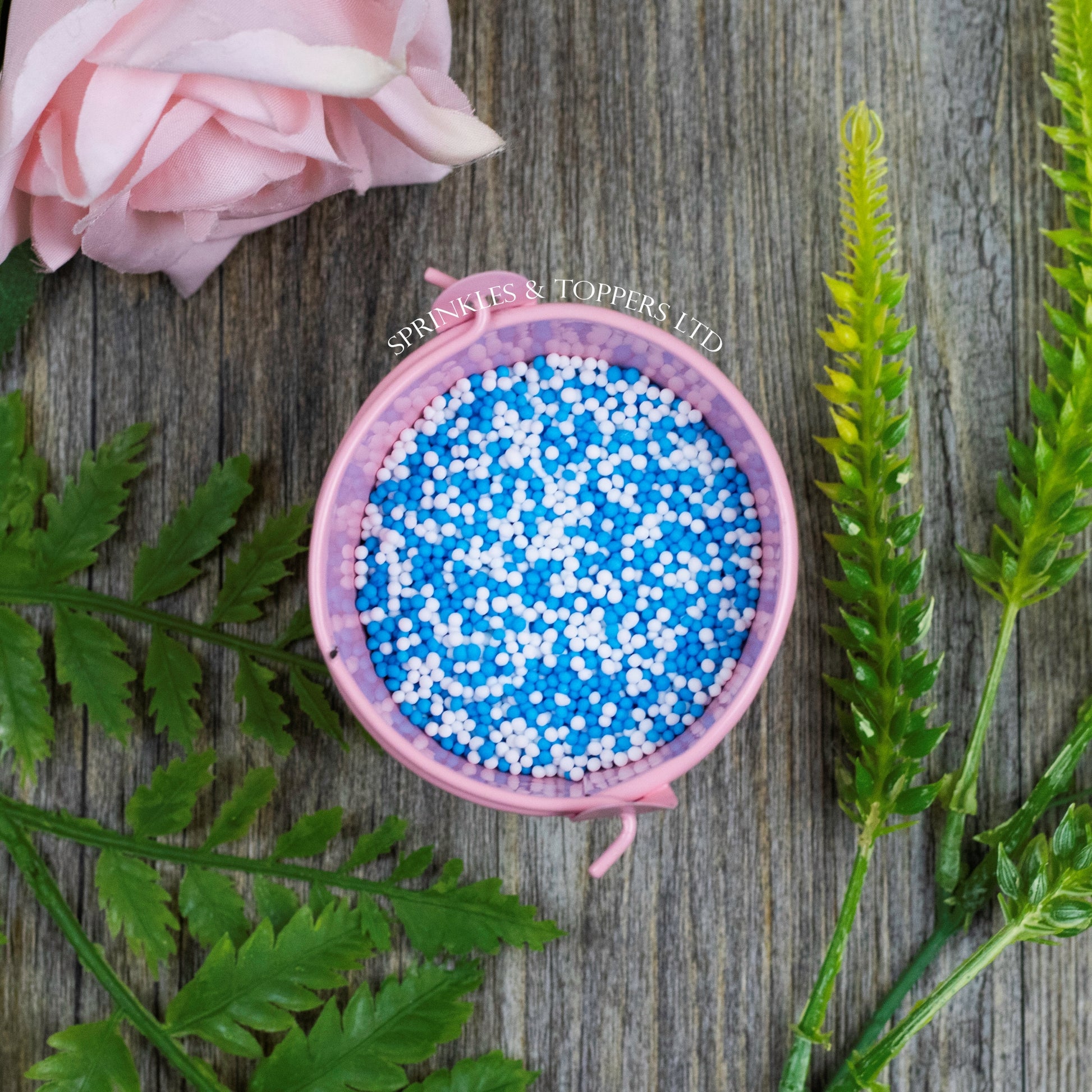 Blue & White 100s & 1000s  These ever popular small sugar balls are perfect to top any cupcake, large cake, ice cream, shake and more...