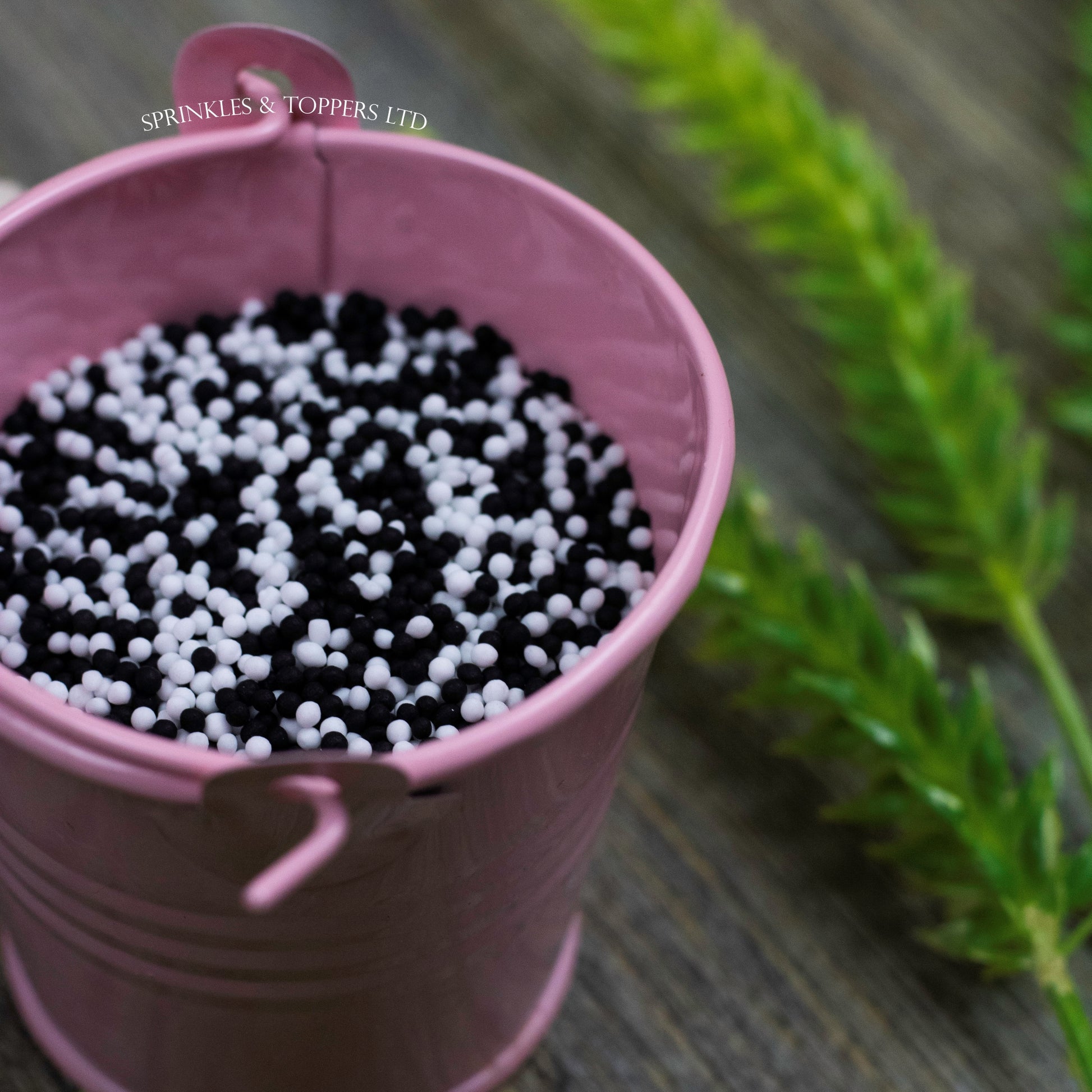 Black & White 100s & 1000s  These ever popular small sugar balls are perfect to top any cupcake, large cake, ice cream, shake and more...