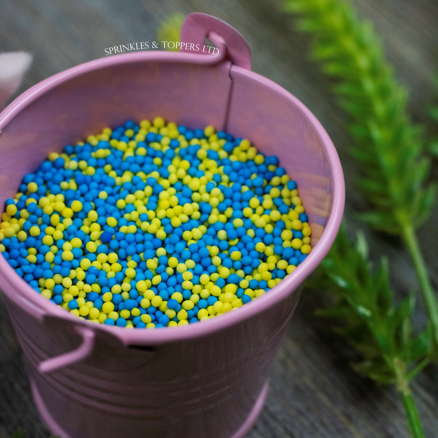 Blue & Yellow 100s & 1000s  These ever popular small sugar balls are perfect to top any cupcake, large cake, ice cream, shake and more...