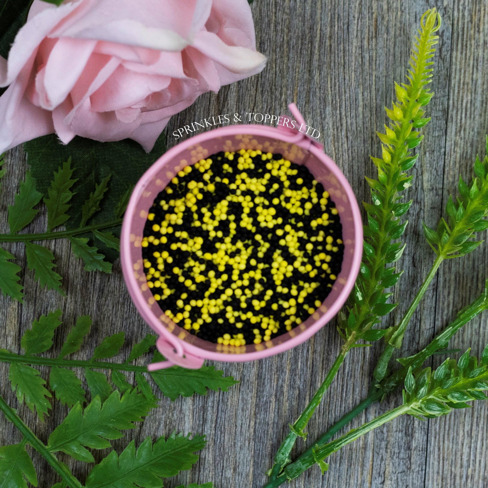 Black & Yellow 100s & 1000s  These ever popular small sugar balls are perfect to top any cupcake, large cake, ice cream, shake and more...