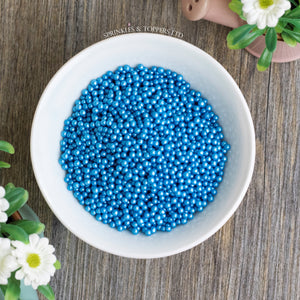 Lovely blue edible sugar pearls with shiny finish 3-4mm (approx)  Perfect to decorate cupcakes, a large cake, ice creams, smoothies, cookies.....the list is endless