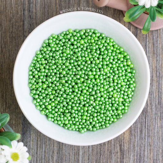 Green Glimmer Pearls (3-4mm) Sprinkles  Lovely edible sugar pearls with shiny finish 3-4mm (approx)  Perfect to decorate cupcakes, a large cake, ice creams, smoothies, cookies.....the list is endless