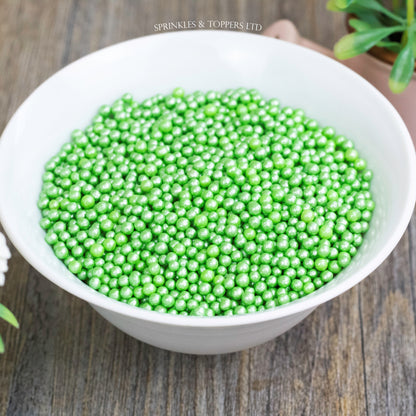 Green Glimmer Pearls (3-4mm) Sprinkles  Lovely edible sugar pearls with shiny finish 3-4mm (approx)  Perfect to decorate cupcakes, a large cake, ice creams, smoothies, cookies.....the list is endless