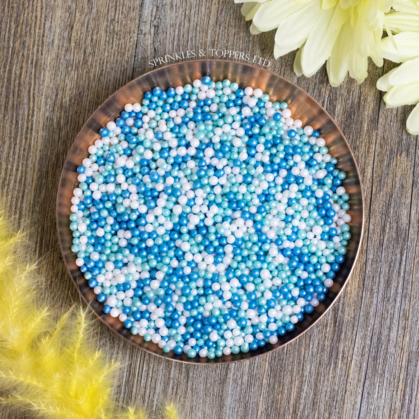 Blue, White & Turquoise Glimmer Pearls Sprinkles Mix  Lovely edible sugar pearls with shiny finish 3-4mm (approx)  Perfect to decorate cupcakes, a large cake, ice creams, smoothies, cookies.....the list is endless