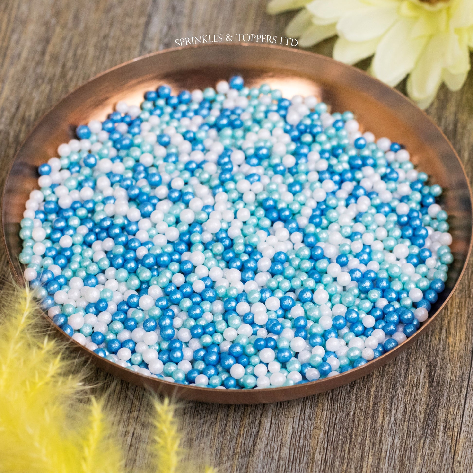 Blue, White & Turquoise Glimmer Pearls Sprinkles Mix  Lovely edible sugar pearls with shiny finish 3-4mm (approx)  Perfect to decorate cupcakes, a large cake, ice creams, smoothies, cookies.....the list is endless