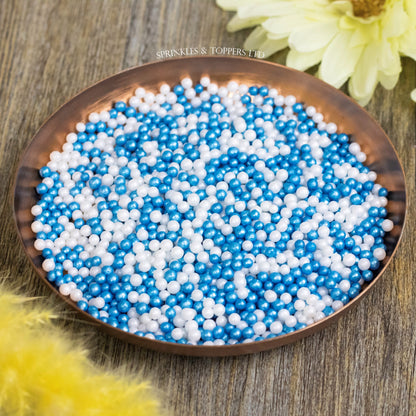 Lovely edible blue and white sugar pearls with shiny finish 3-4mm (approx)  Perfect to decorate cupcakes, a large cake, ice creams, smoothies, cookies.....the list is endless