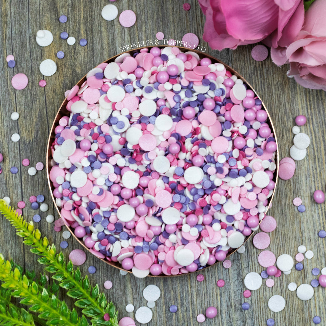 Perfect to top any cupcake or to decorate a larger cake, ice creams, smoothies, cookies and more  Beautiful mix of pink, white & purple 4mm glimmer confetti / pink & white glimmer confetti 10mm / 5mm pink chocolate balls
