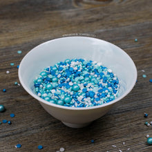Load image into Gallery viewer, Perfect to top any cupcake or to decorate a larger cake, ice creams, smoothies, cookies and more  Lovely mix of blue, turquoise &amp; white glimmer pearls &amp; confetti (4mm), turquoise glimmer pearls (7mm), white sugar strands