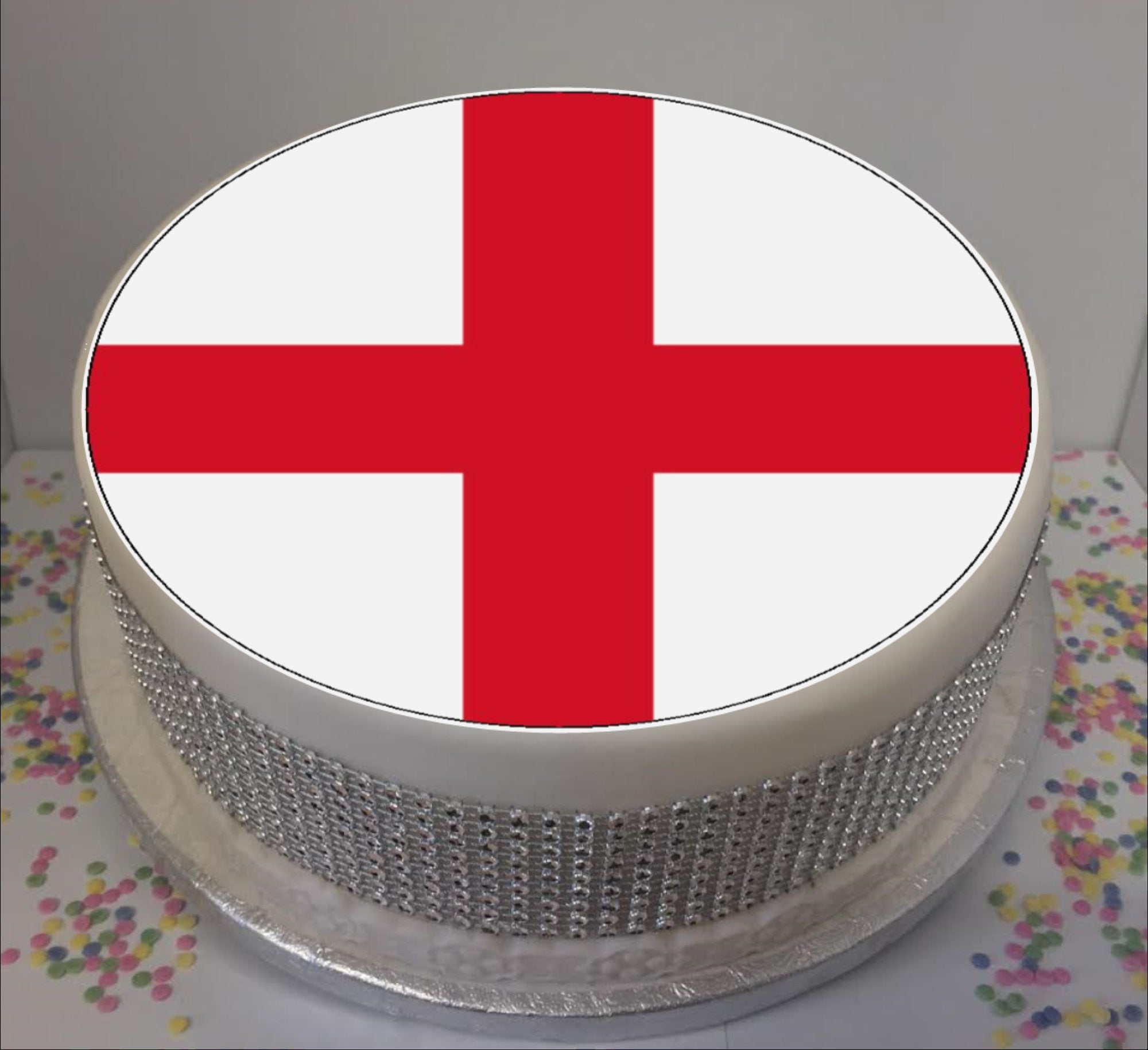 UK Celebration Cake With Flags, Marshmallow And Candy Decorations On A Red  Cake Stand On A White Table Against A Blue Background. Stock Photo, Picture  and Royalty Free Image. Image 59202887.